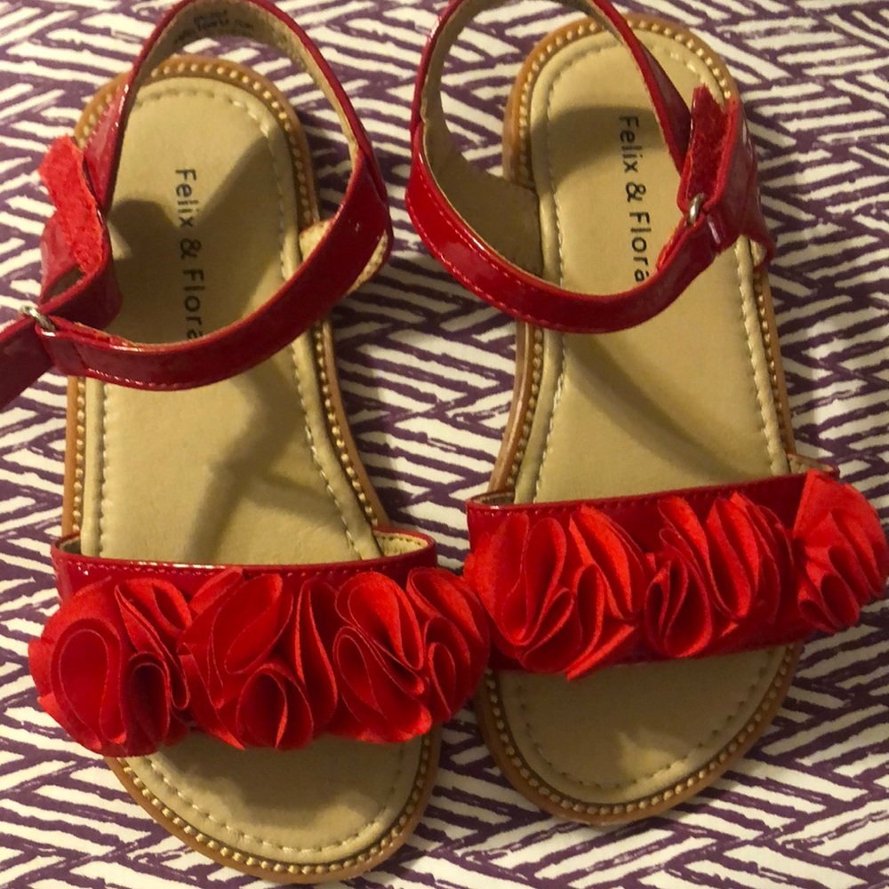 Beautiful little girls red sandals—like new